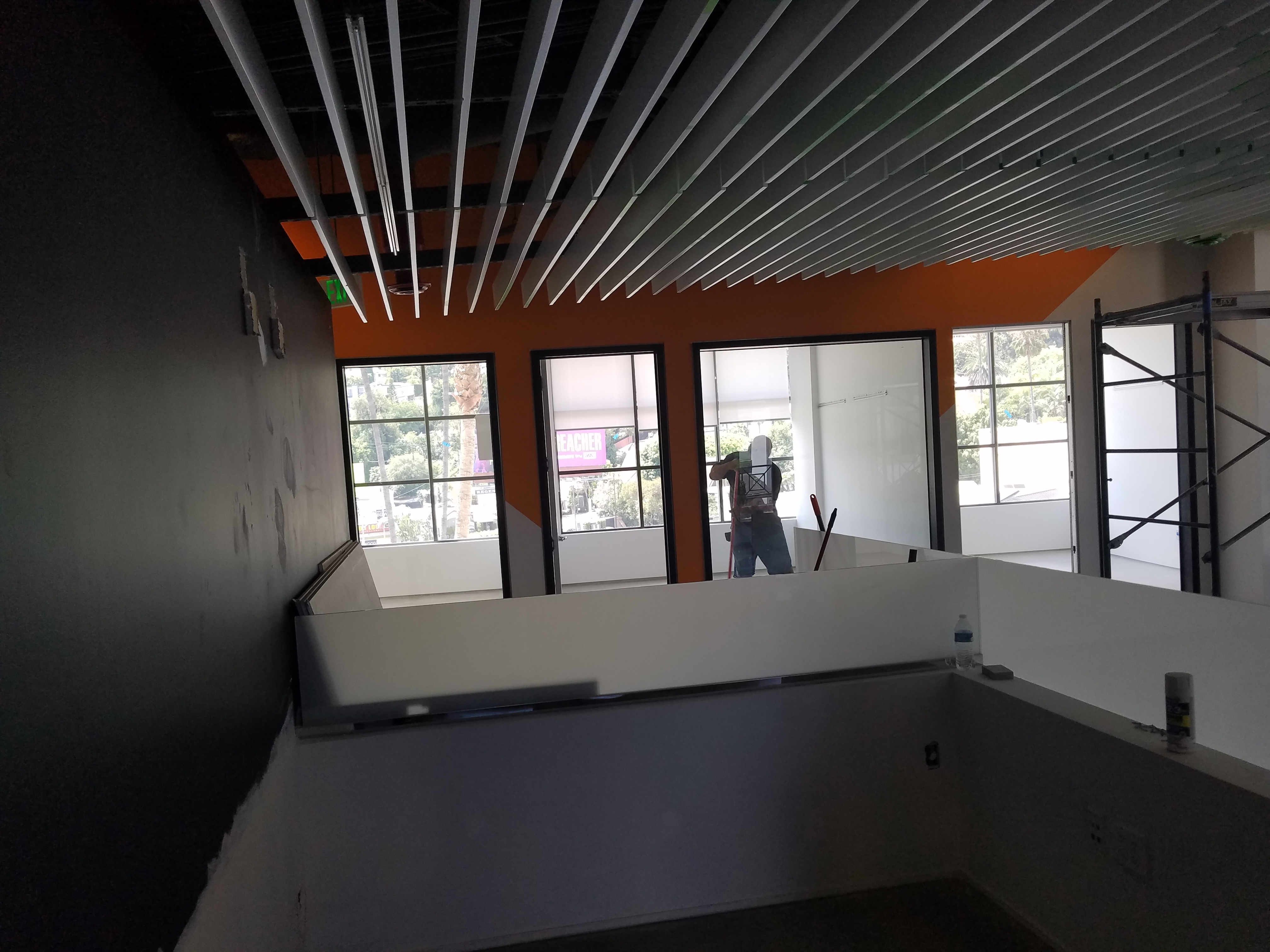 Wood slat ceiling installation 8000 Sunset Strip West Hollywood